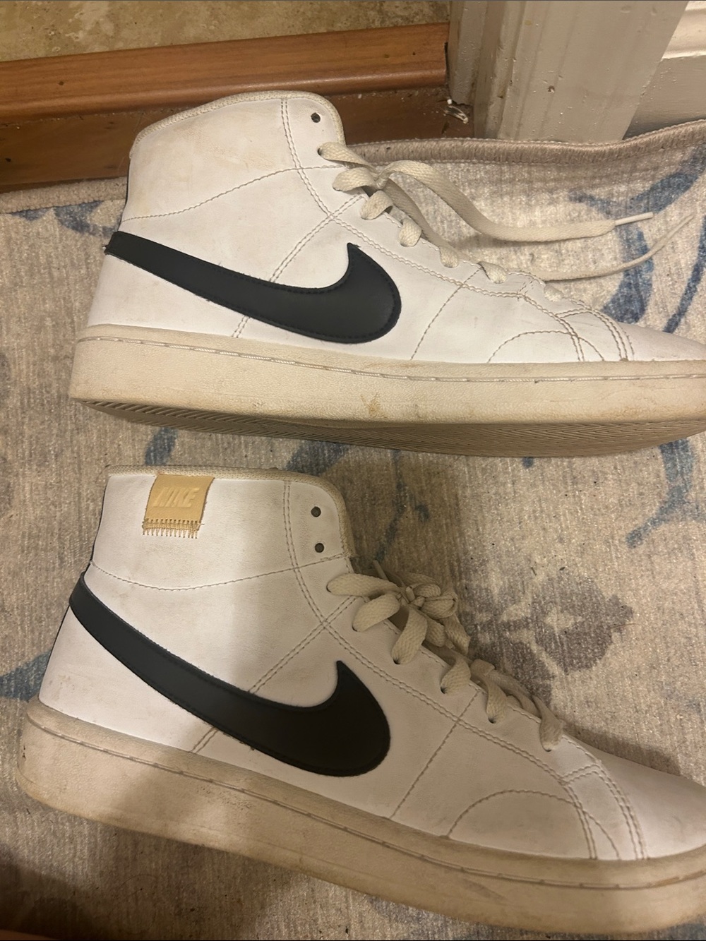 Nike Men’s White High-Top Sneakers with Black Swoosh size 8.5